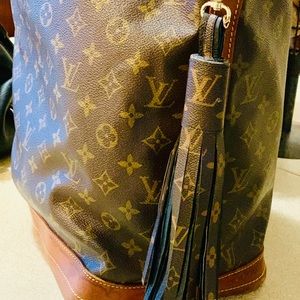 Repurposed handmade Louis Vuitton Tassel.